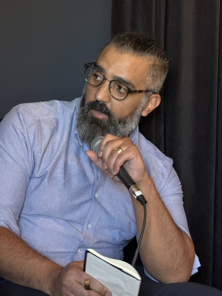 Michael Arrieta speaking at an SEO panel in 2026.